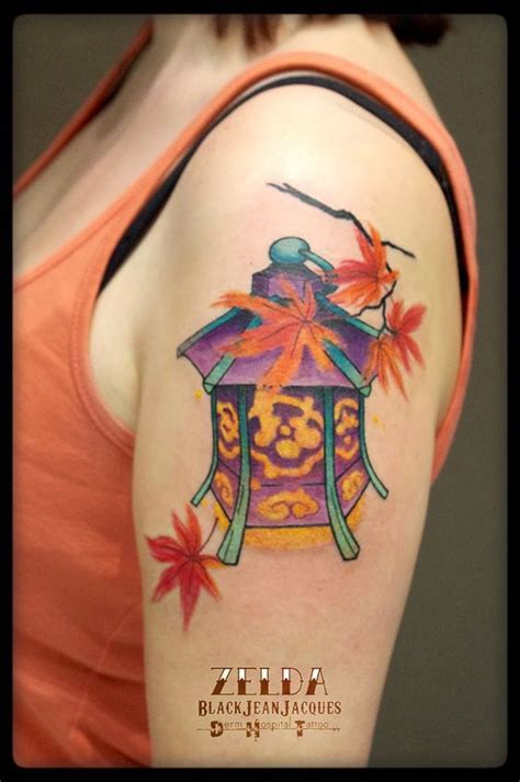 Uncovering the Symbolism Behind Lantern Tattoo。